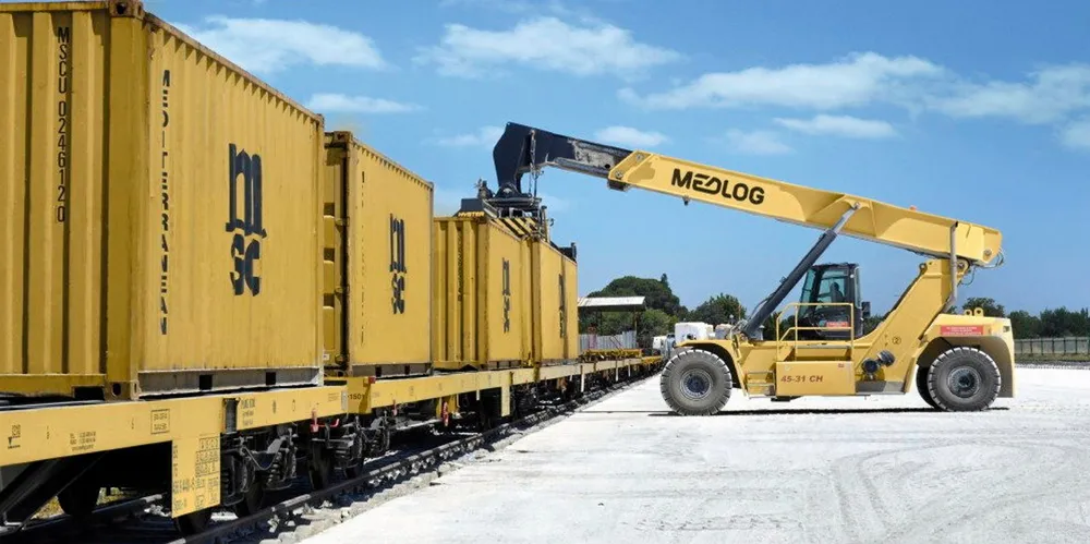 A crane drops off an MSC Mediterranean Shipping Company container. The company is the world’s largest liner operator by vessel container capacity.