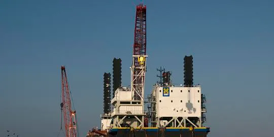 Jack-up barge Lisa A is loading components for the offshore wind farm in the port of Mostyn.