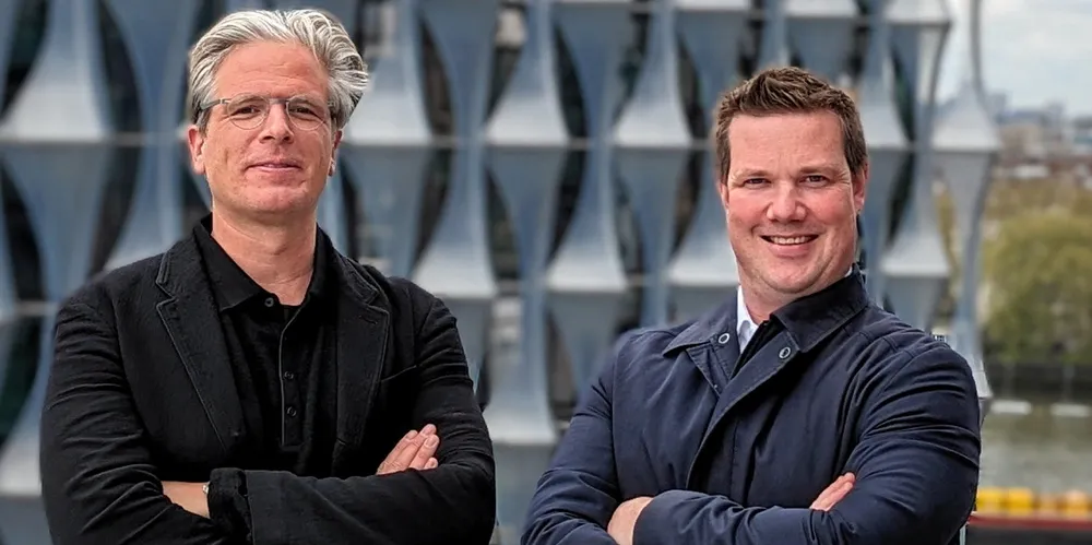 ISG chief executive Adrian Economakis (left) with co-founder Martin White.