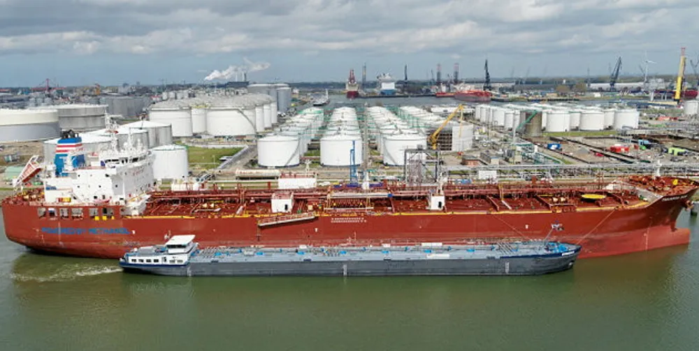 NYK's 50,000-dwt tanker Takaroa Sun (built 2019) is seen at Rotterdam bunkering methanol from a barge in May, in what was said to be the world's first such operation for the green fuel.