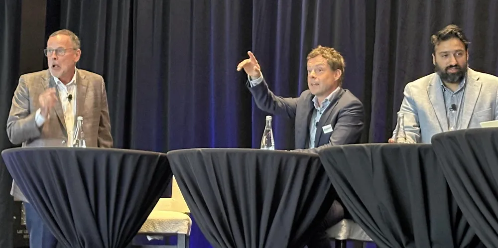 Spliethoff’s Johan Arkema (centre) makes a point at the ASBA conference, flanked by Marsoft president Arlie Sterling (left) and ABS executive Shankar Vaidyanathan.