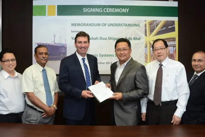 MOU signing: (left to right) Terence Jimbau Dunstan Melling, Md Hassan Abdul Kadir, GPS chief executive Ian Prescott, Yayasan Sabah Dua Shipping chairman Dato’ Abdul Rahman Dahlan, Awang Hidup Hj A Abas and Vince D’Rozario