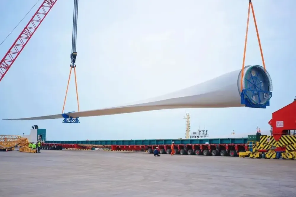 A 153-metre blade for the 26MW turbine being lifted during transportation.