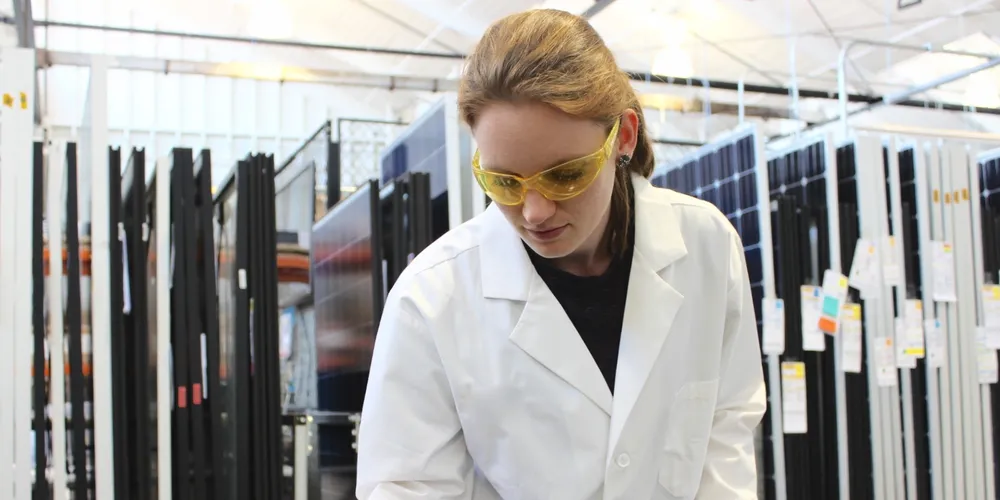 Inspecting a module for defects at DNV GL's testing laboratory in Berkeley, California