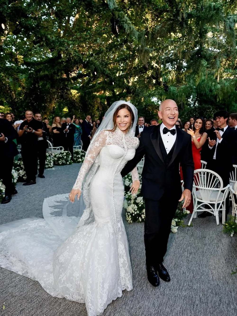 Amazon Founder Jeff Bezos and Media Personality Lauren Sanchez Bezos react on the day of their wedding in Venice, Italy, June 27, 2025 in this picture obtained from social media. @laurensanchezbezos via Instagram/via REUTERS THIS IMAGE HAS BEEN SUPPLIED BY A THIRD PARTY. MANDATORY CREDIT. NO RESALES. NO ARCHIVES.