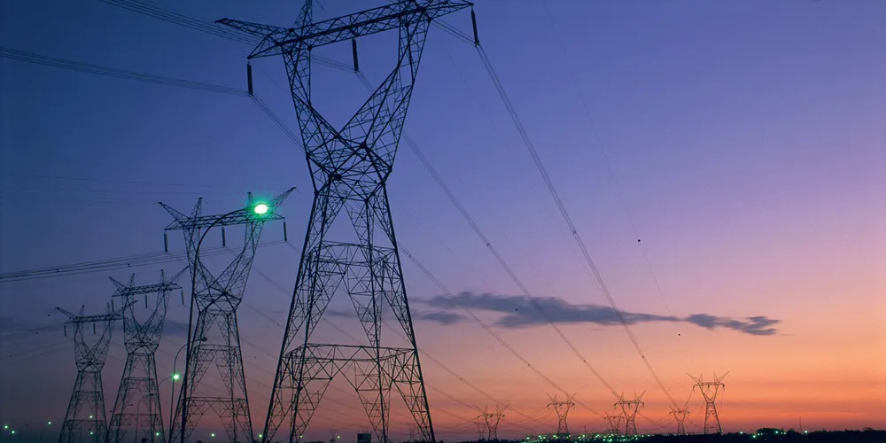 Power lines transmitting power from Brazil's south