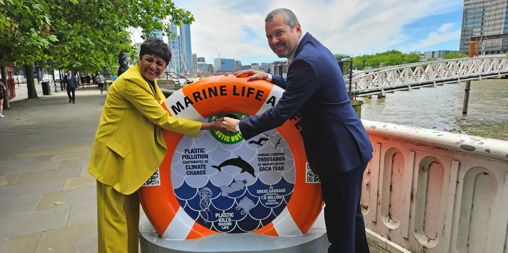 GreenSeas Trust founder and trustee Fazilette Khan (left) and IMO secretary general Arsenio Dominguez with BinForGreenSeas number 18 on London’s embankment.