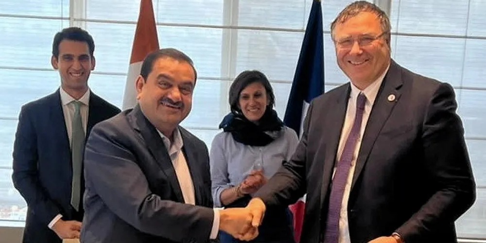 Gautam Adani (left), chairman of Adani Group, agrees the deal with TotalEnergies CEO Patrick Pouyanne.