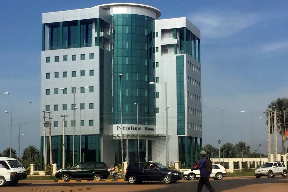 Extra time: Gambia's tallest building, Petroleum House, houses the oil ministry at a crossroads in Banjul