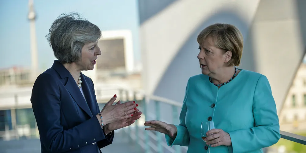 British Prime Minister Theresa May (left) meets German chancellor Angela Merkel
