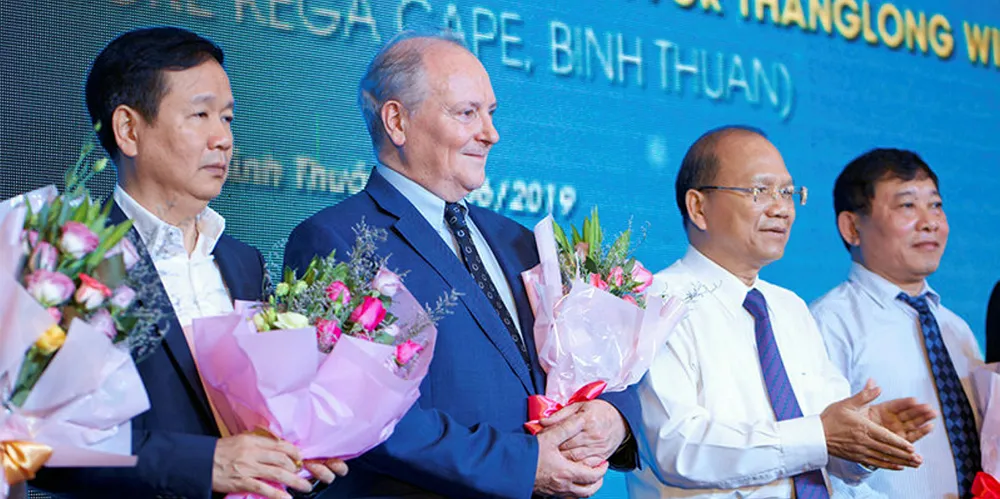Enterprize Energy chairman Ian Hatton (second left) at the ceremony to mark the granting of a survey licence for the Thang Long project.