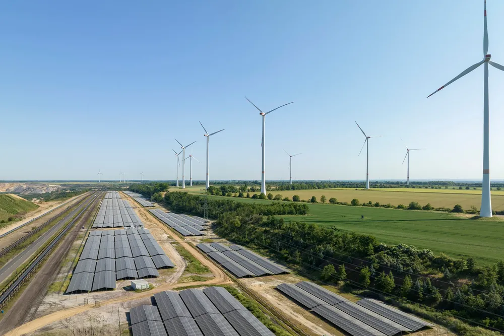 Garzweiler solar farm with wind turbines in background