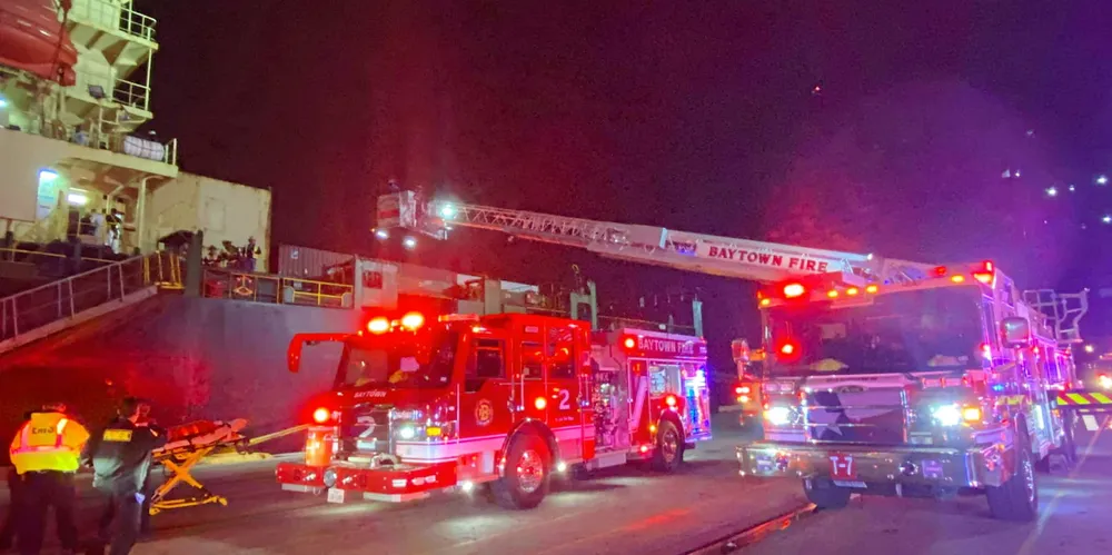 Firefighters respond to the January blaze on the 2,174-teu Stride (built 1997).