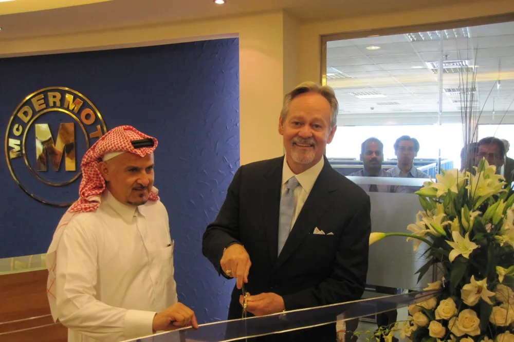 Launch: Shoaibi Group director Khalid al-Shoaibi (L) and McDermott boss Stephen Johnson cut the ribbon on new consulting firm