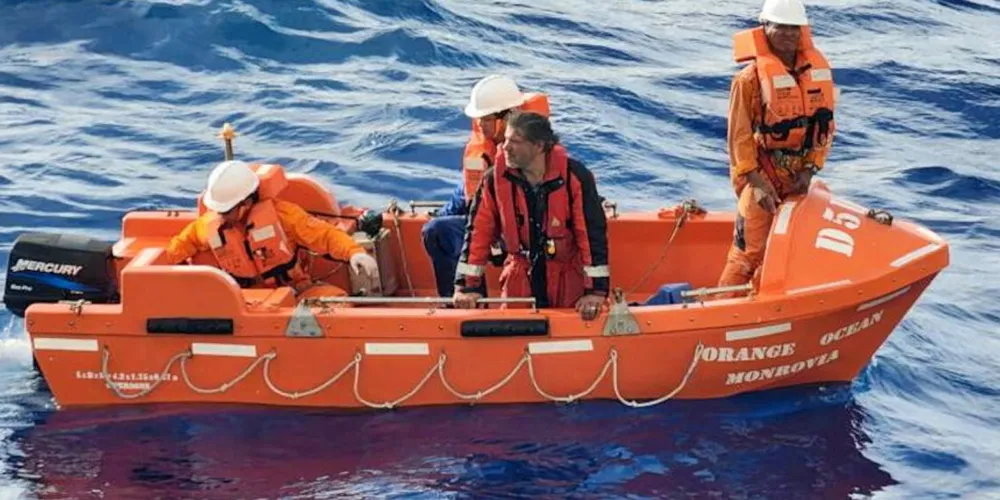 Sailor Kirill Mikhaylov is saved by the crew of the Orange Ocean.