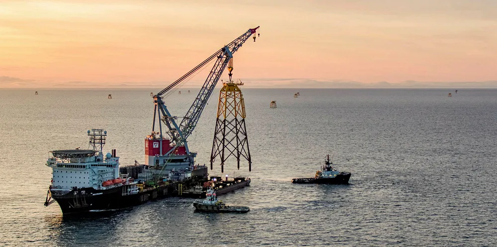 One of the 84 jacket foundations at the Beatrice project about to enter the water.