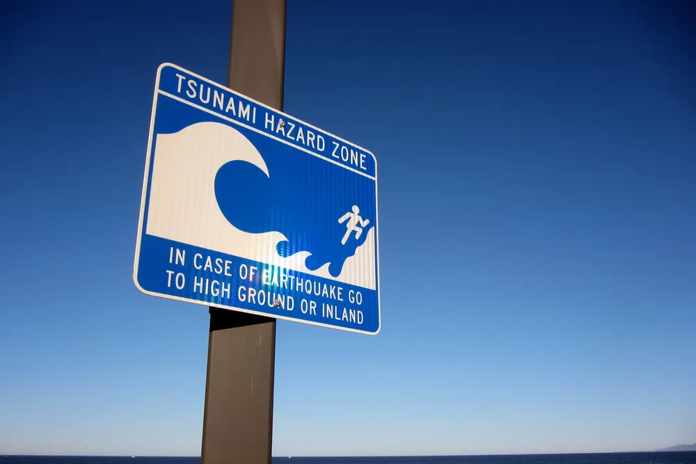A warning sign in a tsunami hazard zone.