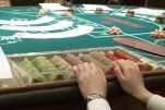 Genting cashes in its chips