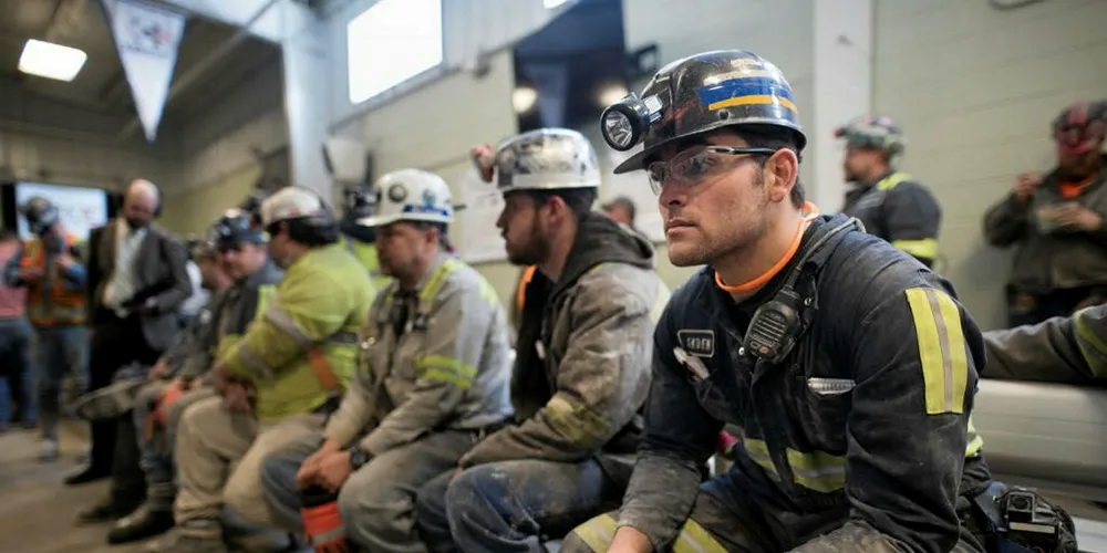 Coal miners await a political speech in the US state of Pennsylvania