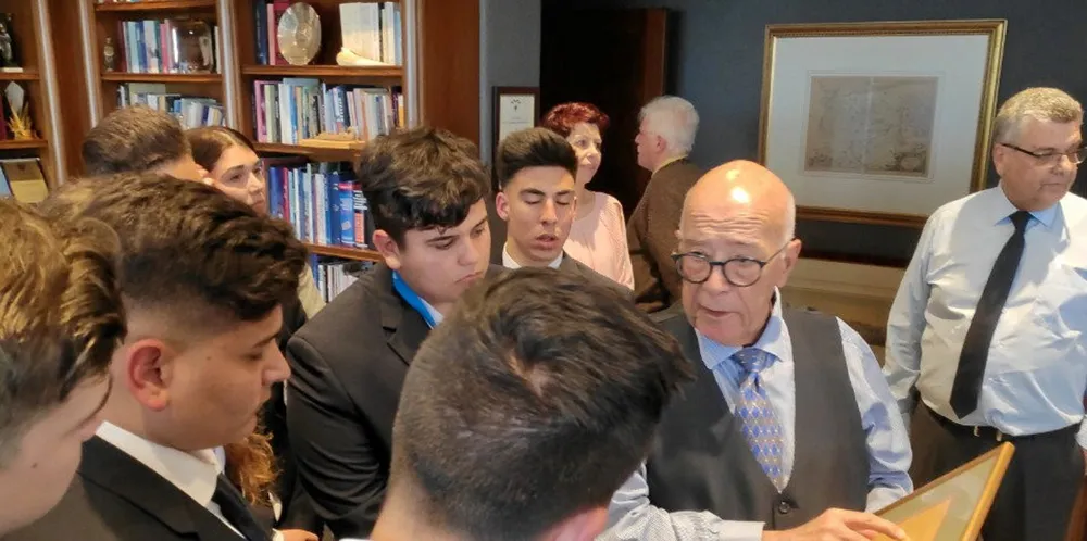 Captain Panagiotis Tsakos, founder of Tsakos Shipping & Trading, speaks to students of a maritime high-school he founded on his home island of Chios, Greece.