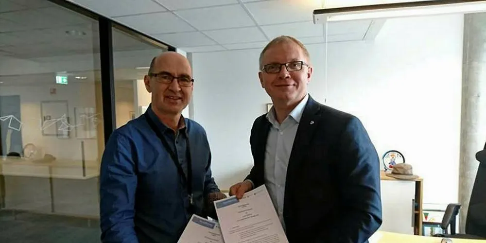 FORTSETTER SAMARBEID: Råfisklagets assisterende direktør, Svein Ove Haugland og Nils Kristian Sørheim Nilsen, Nord-Norges Europakontors direktør.Foto: Pressefoto