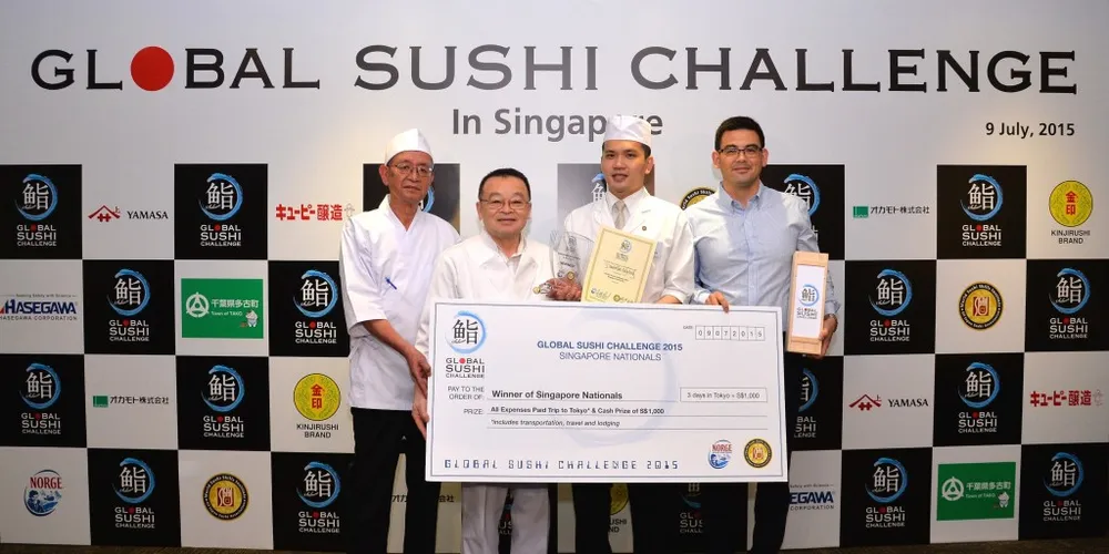 The Singapore round of the Global Sushi Challenge was won by Damien Tan King Meng from Hide Yamomoto at Marina Bay Sands. L-R: Masayoshi Goto (Trainer, World Sushi Skills Institute), Masayoshi Kazato (Director, World Sushi Skills Institute), Chef Damien Tan King Meng (Winner), Jon Erik Steenslid (Regional Director, Norwegian Seafood Council)