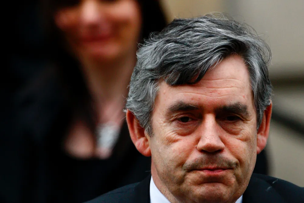 Mourning: UK Prime Minister Gordon Brown leaves the service