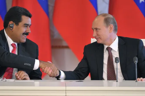 Hands of influence: Maduro (left) and Putin in charge of oil powerhouses