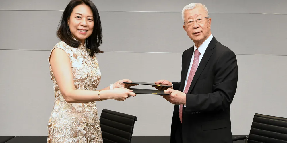 Elaine Lam, head, global corporate banking, OCBC Bank and CK Ong, president, U-Ming Marine Transport at $70m sustainability fleet renewal loan signing.