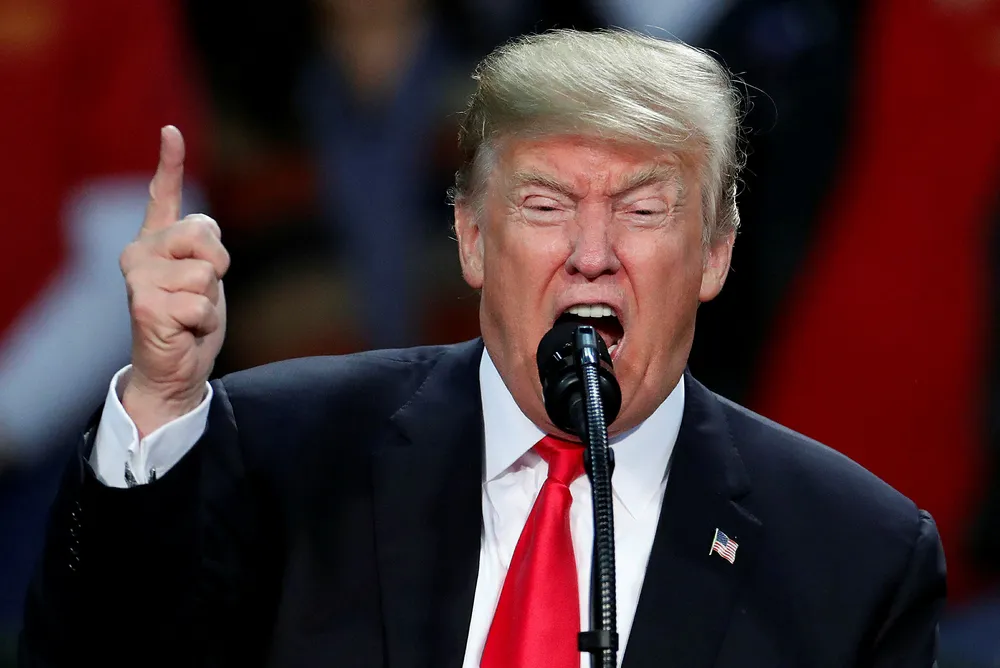President Donald Trump under møtet. Foto: REUTERS/Carlo Allegri