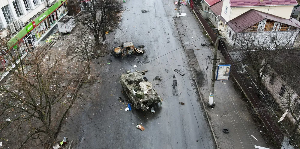 A destroyed armoured vehicle is seen on a street in Borodyanka, as Russia’s invasion of Ukraine continues in the Kyiv region.
