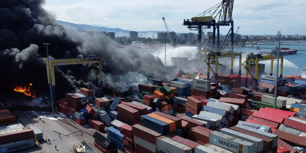 Smoke rises from burning containers at the port in the earthquake-stricken town of Iskenderun.