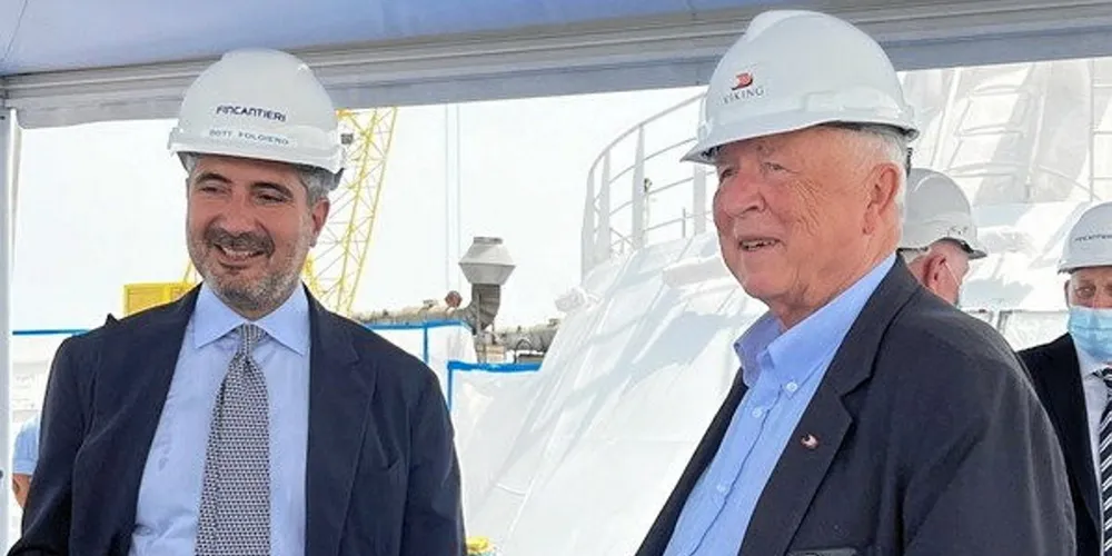 Pierroberto Folgiero (left), chief executive of Fincantieri, and Torstein Hagen, chairman of Viking, attend the floating out of the cruise ship Viking Saturn in Ancona in June 2022. Fincantieri posted a hefty loss for 2022.