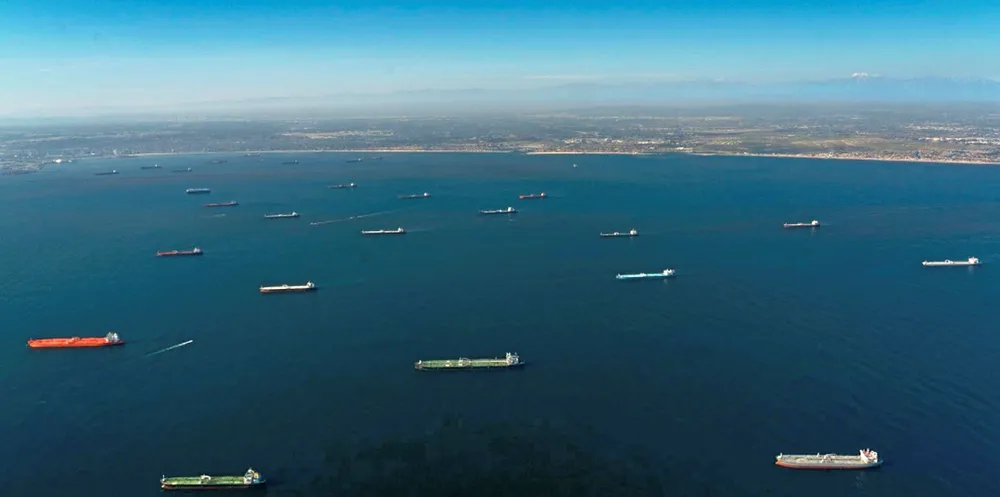 Tankers are anchored off Long Beach, California, in April.