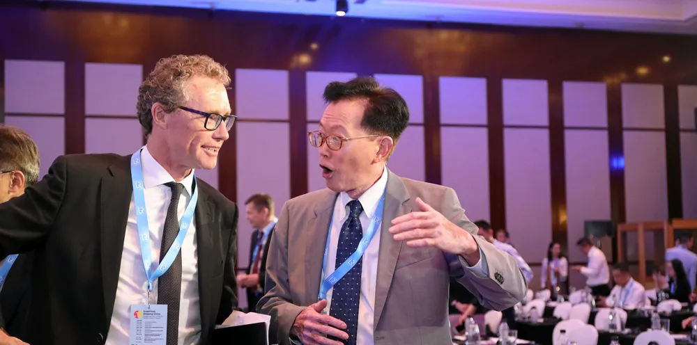 Hsu Chih Chien, chairman of Eddie Steamship (right), makes a point to TradeWinds editor-in-chief Julian Bray.