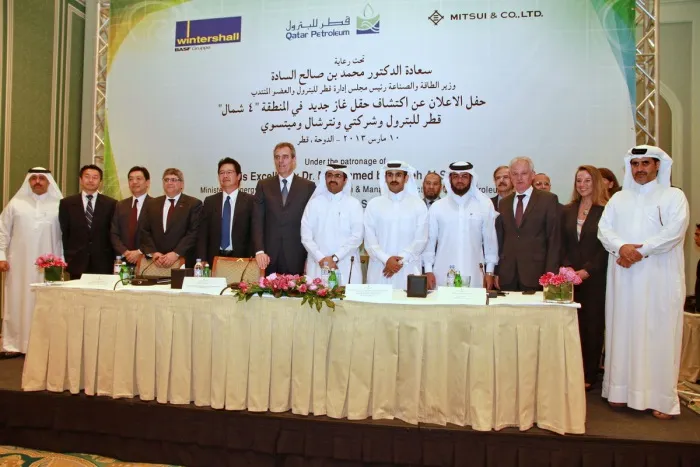 Khuff discovery: group photo of officials from Qatar Petroleum, Wintershall and Mitsui