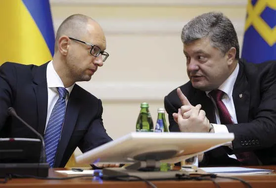 Optimistic: Ukraine's President Petro Poroshenko (right) with PM Arseny Yatsenyuk