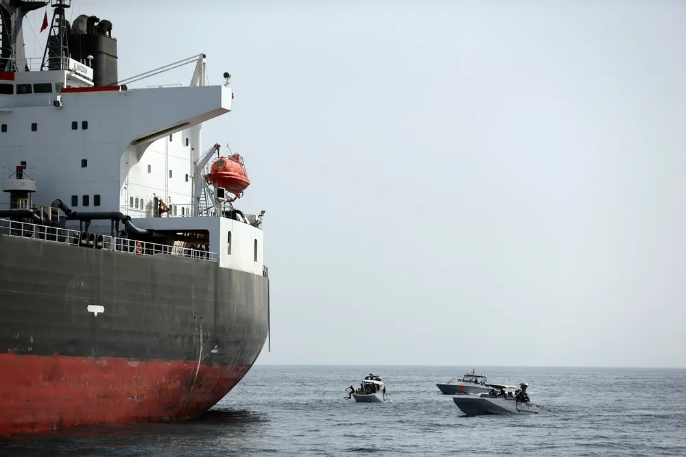 Supply threat: UAE Navy boats next to Al Marzoqah Saudi Arabia tanker off the Port of Fujairah earlier this week