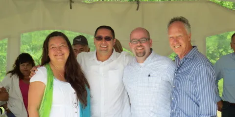 McLeod Lake Indian Band chief Derrick Orr (second from left) with EDF EN Canada's David Warner (to his left).