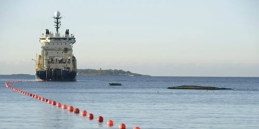 This picture taken on October 12, 2015 shows the C-Lion1 submarine telecommunications cable being laid to the bottom of the Baltic Sea.