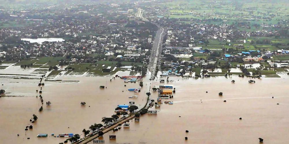 Gujarat shrimp farmers financially impacted by the floods.