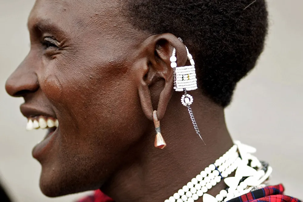 All smiles: Tanzania's Maasai warrior in traditional costume
