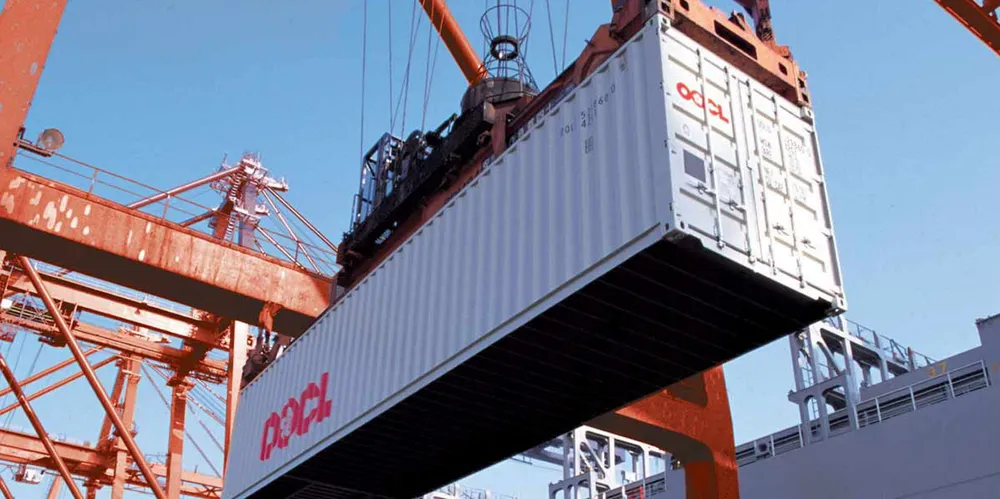 An Orient Overseas Container Line (OOCL) container being loaded onto a chassis. The company was the subject of a patent infringement lawsuit over its container tracking system.