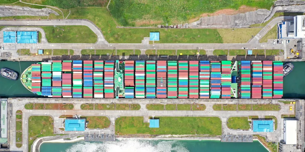 The 14,400-teu Thalassa Elpida (built 2014), the largest vessel to transit the Panama Canal, crosses the waterway in August 2019. A drought in Panama has restricted transits, causing long waiting times for ships.