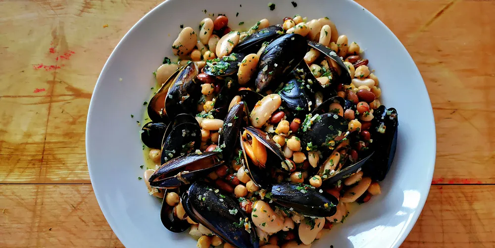 Beans and mussels is one example of a 'seagan' dish.