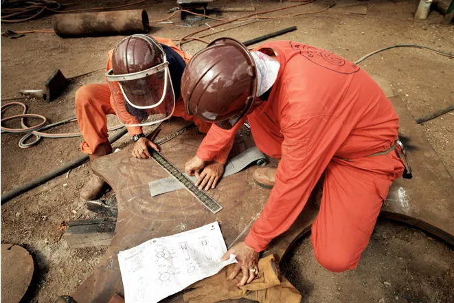 No angel?: J Ray skilled workers on the job