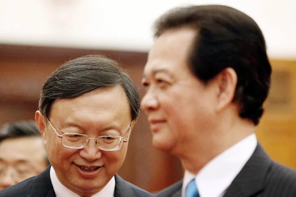 Tough talks: China's Yang Jiechi, left, and Vietnamese PM Nguyen Dung fail to see eye to eye over drilling row