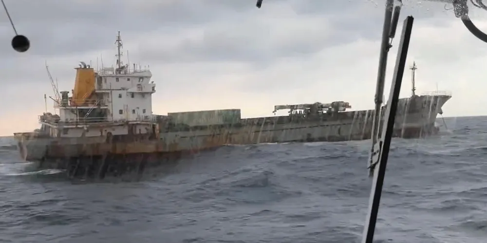 Taiwan’s coast guard released a photo of the ship suspected of breaking an undersea communications cable.