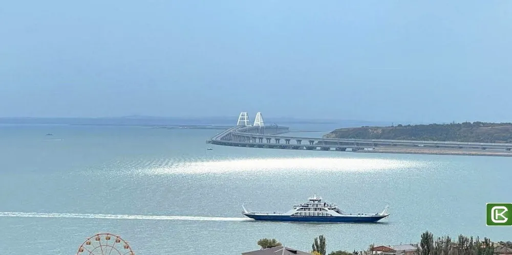 A ship is seen near the Kerch bridge, which links Russia to Russian-occupied Crimea.