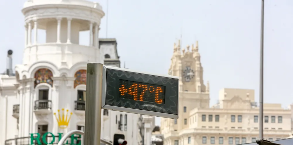 A thermometer at a bus stop on Gran Via, marks 47ºC in Madrid, Spain.
